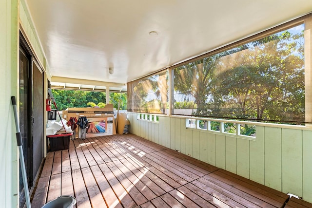 unfurnished sunroom featuring a healthy amount of sunlight