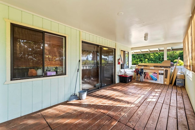 wooden terrace with a porch