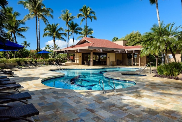 view of swimming pool featuring a patio