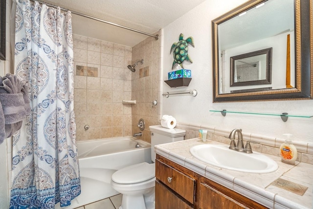 full bathroom featuring tile patterned floors, vanity, a textured ceiling, shower / bathtub combination with curtain, and toilet