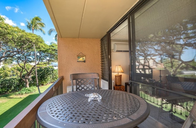 balcony featuring a wall unit AC