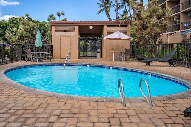 view of pool featuring a patio