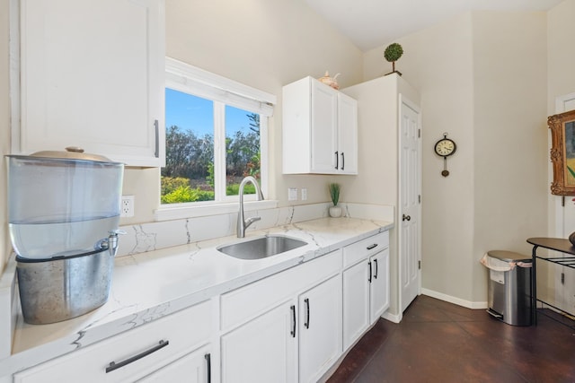 140 Kahana Ridge Dr, Lahaina, HI 96761 - kitchen featuring light stone countertops and white cabinets