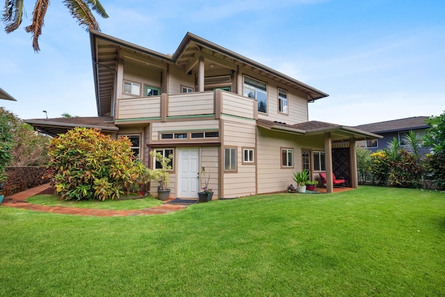 140 Kahana Ridge Dr, Lahaina, HI 96761 - rear view of house with a balcony and a yard