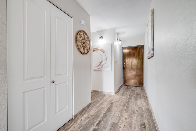 hallway featuring light wood-type flooring