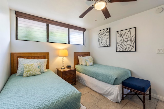 2653 S Kihei Rd Unit 306, Kihei, HI 96753 - bedroom featuring light tile patterned flooring and a ceiling fan