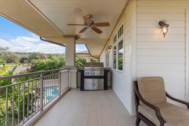 161 Wailea Ike Pl Unit C204, Kihei, HI 96753 - balcony with ceiling fan, view of pool area, and area for grilling