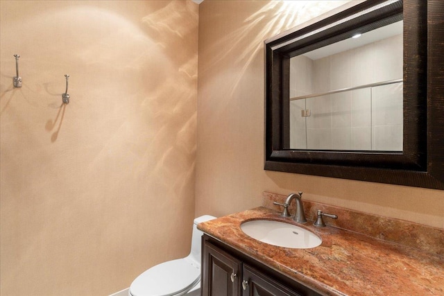 161 Wailea Ike Pl Unit C204, Kihei, HI 96753 - bathroom with vanity, toilet, and a shower