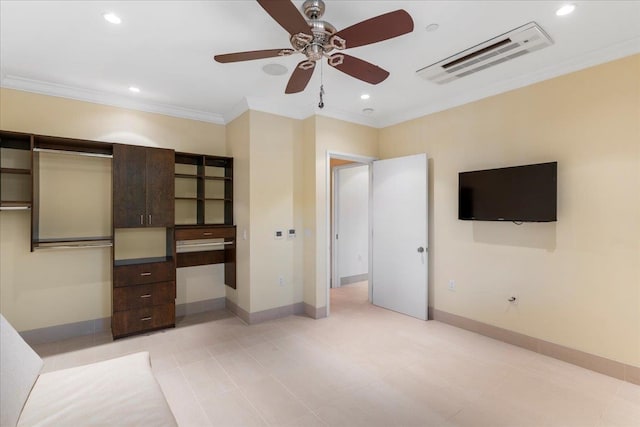 unfurnished bedroom featuring built in desk, ceiling fan, and ornamental molding