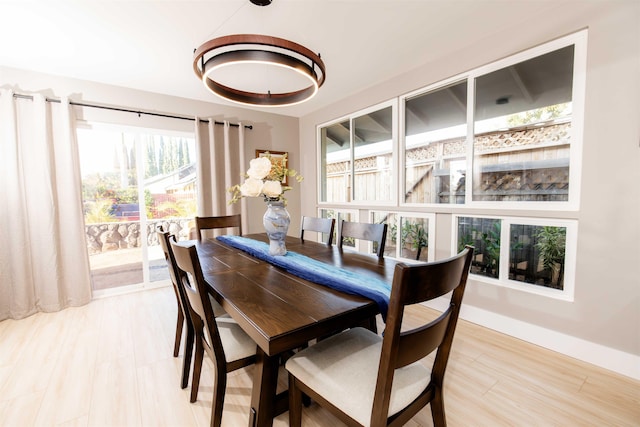 dining room featuring baseboards