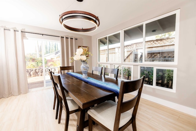 dining room featuring baseboards