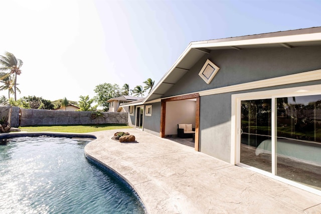 view of pool featuring a yard, a fenced backyard, a fenced in pool, and a patio