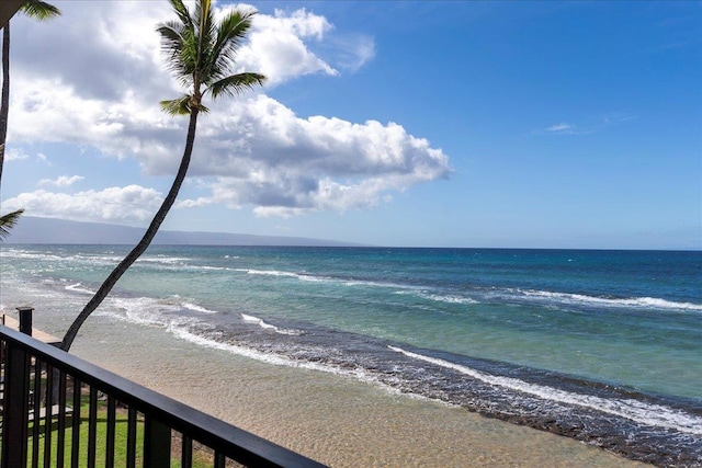 view of water feature with a beach view