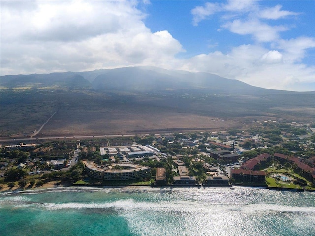 bird's eye view featuring a water and mountain view