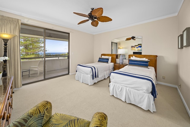 bedroom featuring carpet flooring, ornamental molding, and access to exterior