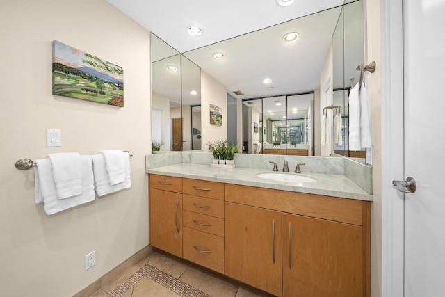 bathroom featuring tile patterned floors and vanity