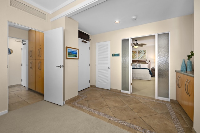 hallway with light tile patterned flooring