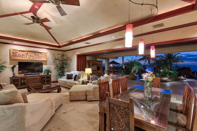 living room featuring ceiling fan, lofted ceiling, and a raised ceiling