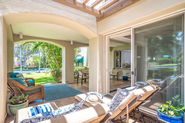 view of terrace featuring a pergola and an outdoor hangout area