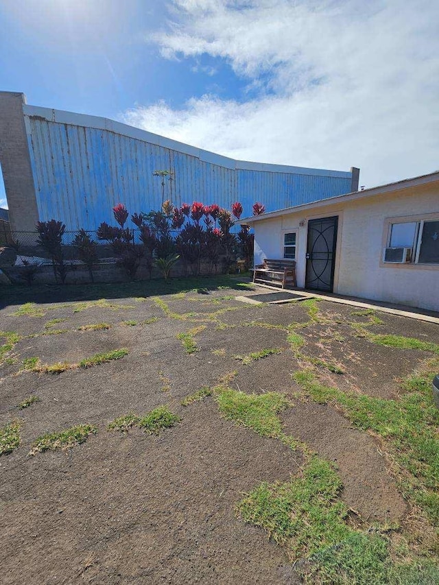 view of building exterior featuring cooling unit