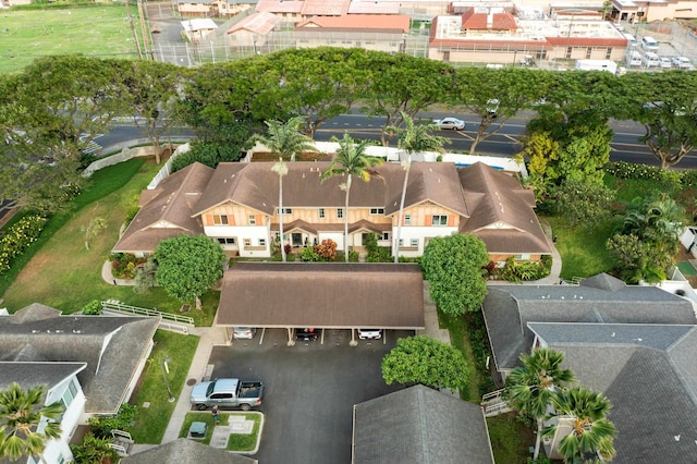 birds eye view of property with a residential view