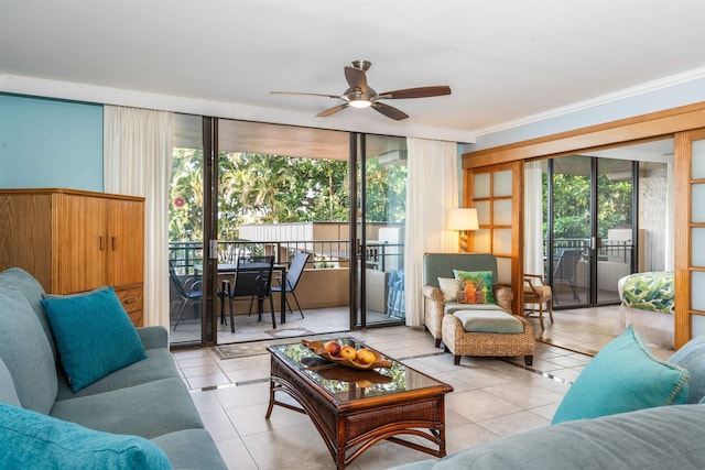 tiled living room with ceiling fan, a healthy amount of sunlight, and crown molding