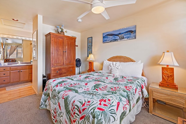 bedroom with ceiling fan and ensuite bathroom