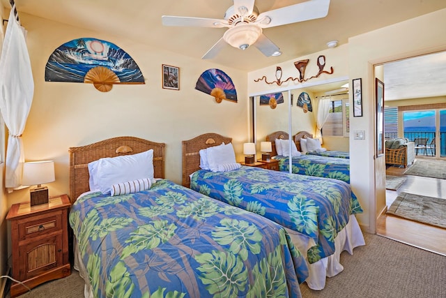 bedroom featuring ceiling fan and carpet flooring