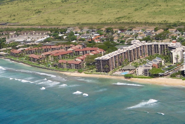 aerial view with a view of the beach and a water view