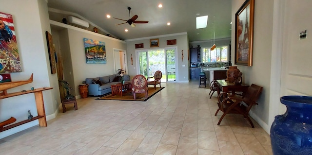 516 Polulani Dr, Wailuku, HI 96793 - living area with a ceiling fan, recessed lighting, high vaulted ceiling, a skylight, and crown molding