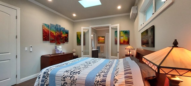 bedroom featuring a wall mounted AC, ensuite bath, a skylight, and ornamental molding