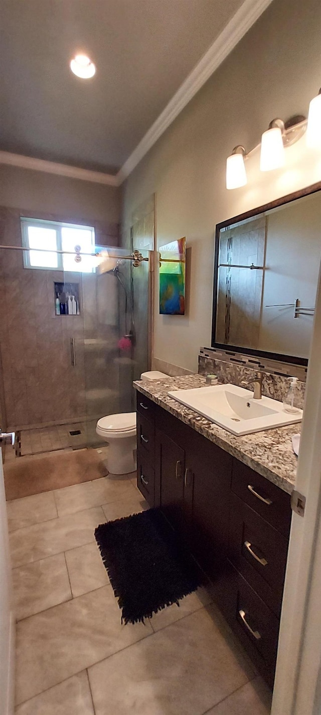 516 Polulani Dr, Wailuku, HI 96793 - bathroom featuring ornamental molding, vanity, a shower stall, and tile patterned flooring