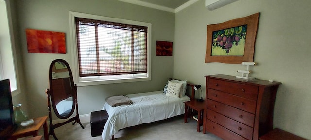 bedroom featuring crown molding and light carpet