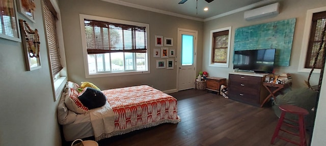 bedroom featuring a wall mounted air conditioner, dark hardwood / wood-style flooring, ceiling fan, and ornamental molding