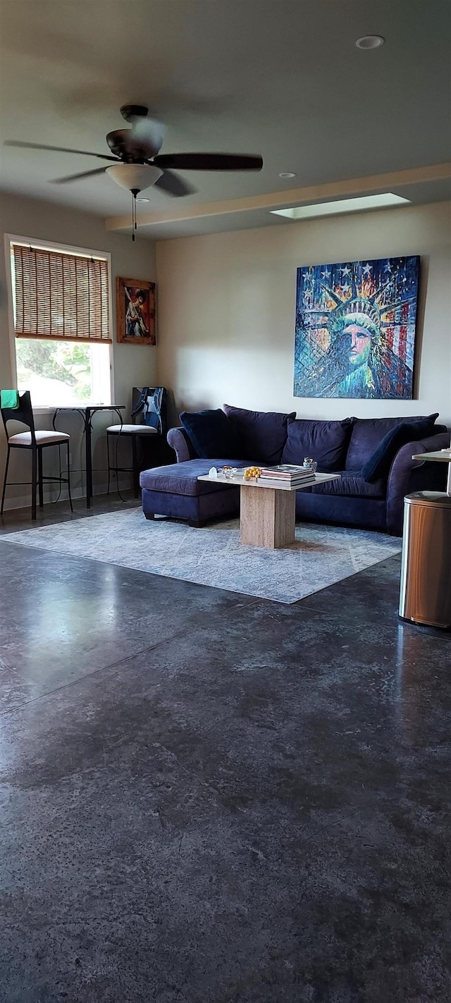 unfurnished living room featuring ceiling fan