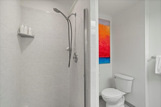 3300 Wailea Alanui St Unit 3A, Kihei, HI 96753 - bathroom featuring a shower stall, toilet, and baseboards