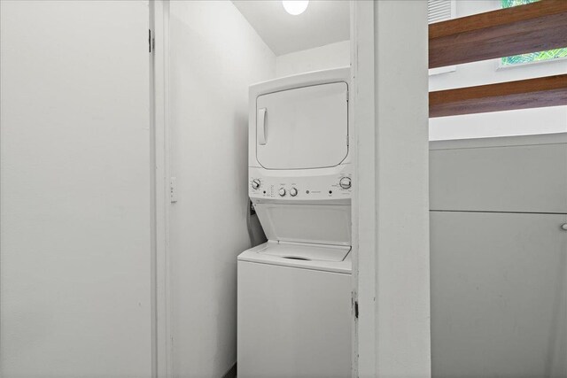 3300 Wailea Alanui St Unit 3A, Kihei, HI 96753 - washroom featuring stacked washer / drying machine