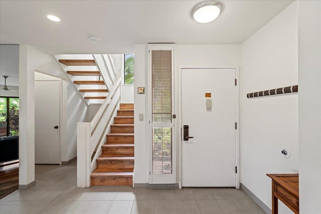 3300 Wailea Alanui St Unit 3A, Kihei, HI 96753 - foyer with stairs, light tile patterned flooring, baseboards, and recessed lighting