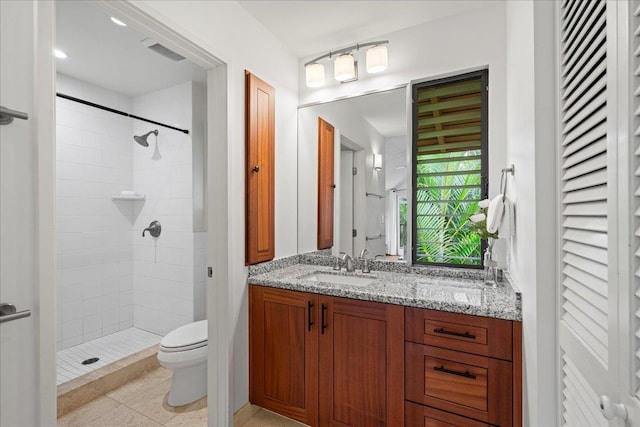 3300 Wailea Alanui St Unit 3A, Kihei, HI 96753 - full bath with toilet, a tile shower, vanity, and tile patterned flooring