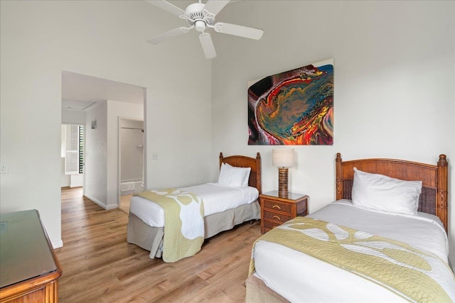 3300 Wailea Alanui St Unit 3A, Kihei, HI 96753 - bedroom with light wood-style floors, baseboards, and ceiling fan