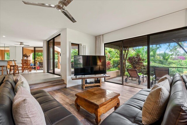3300 Wailea Alanui St Unit 3A, Kihei, HI 96753 - living room featuring ceiling fan, plenty of natural light, and wood finished floors
