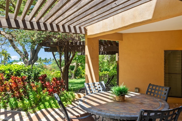 3300 Wailea Alanui St Unit 3A, Kihei, HI 96753 - view of patio / terrace with outdoor dining space and a pergola