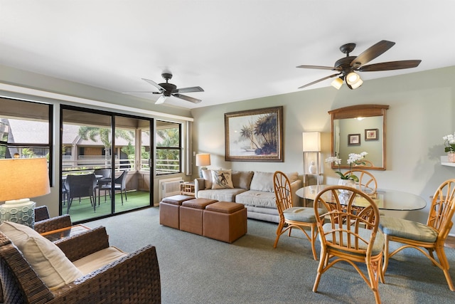 living room featuring carpet floors and ceiling fan