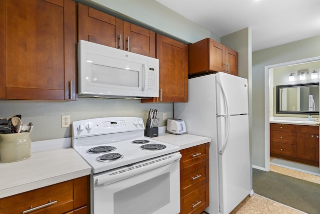 kitchen featuring white appliances