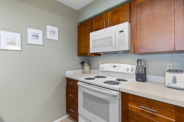 kitchen featuring white appliances