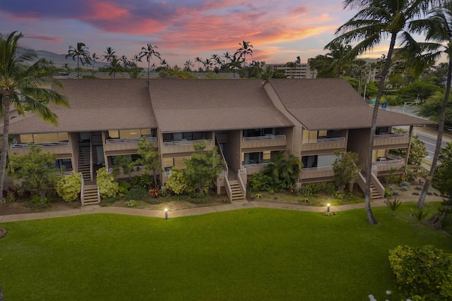 view of outdoor building at dusk