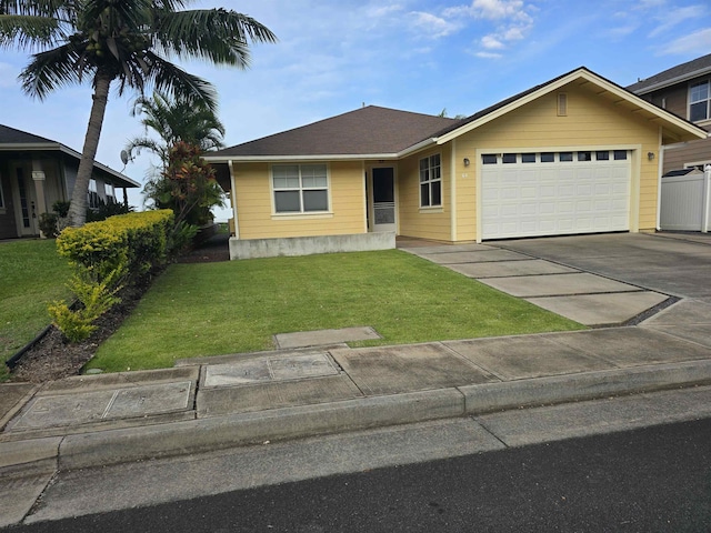 view of front of property with a garage, a front lawn, and concrete driveway