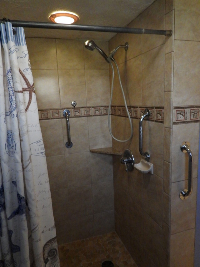 bathroom with a shower with curtain