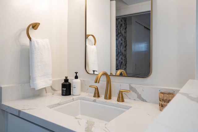 bathroom featuring backsplash and vanity