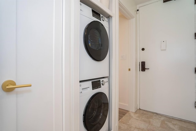 washroom with stacked washer / dryer